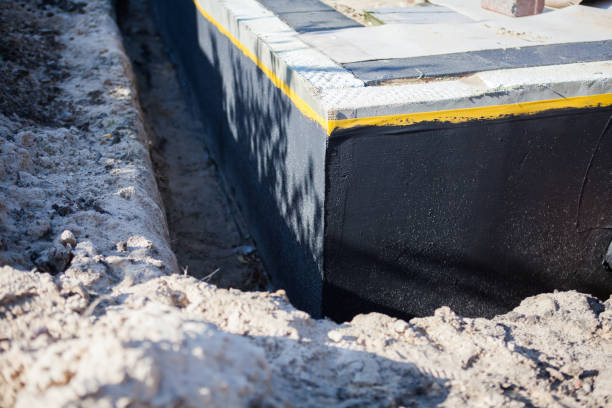 Professional Emergency Waterproofing technician working in Byron, NY